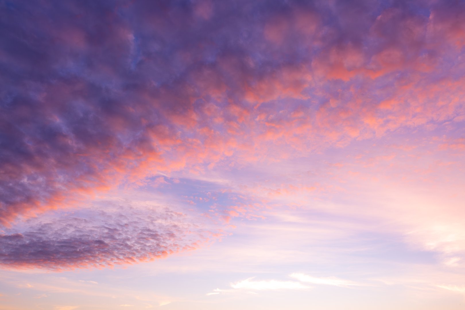 Clouds and pink sky backdrop,Pastel Light pink clouds in the blue sky during dawn sunset, sundown backgroung,