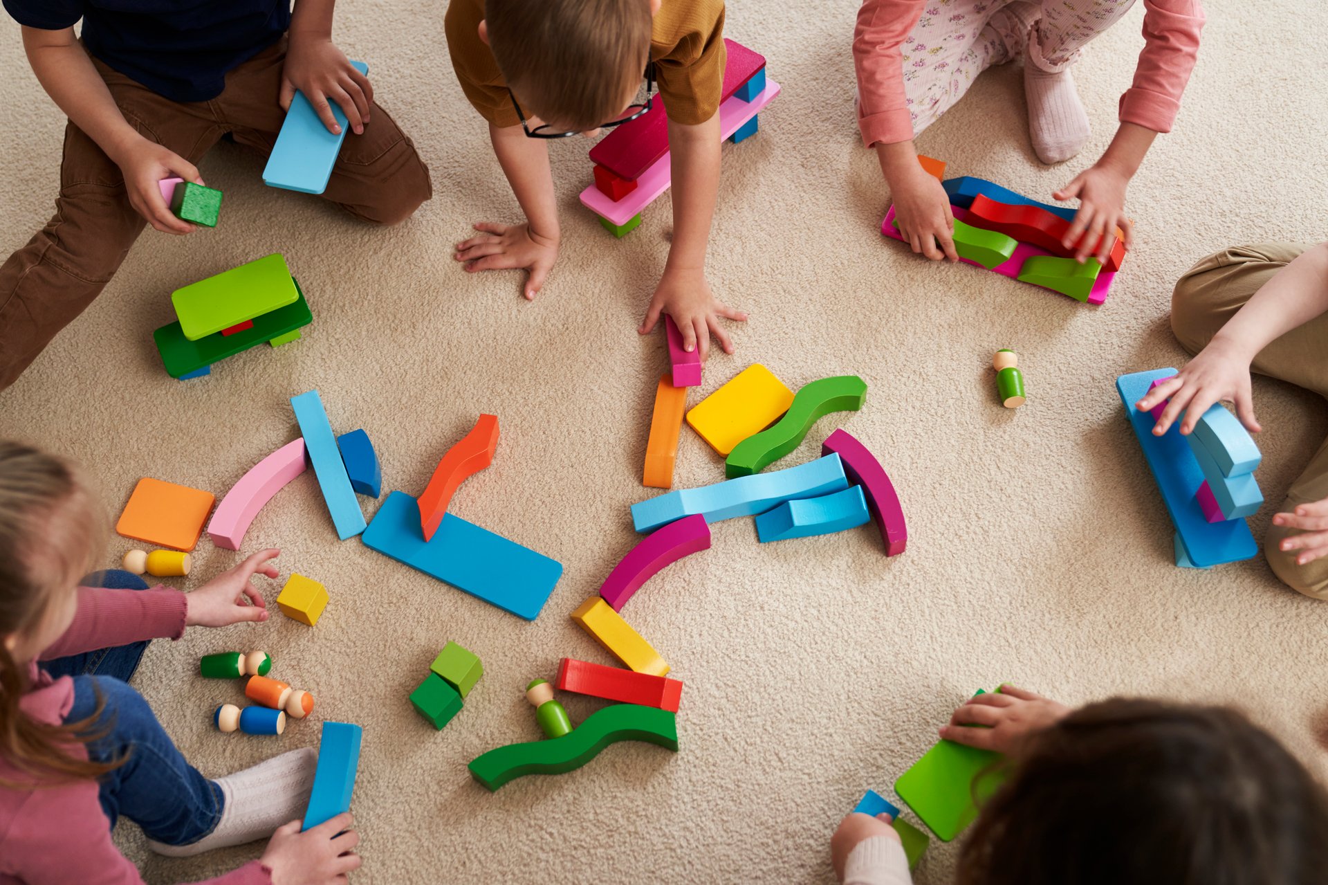 Top view of children having sensory exercises