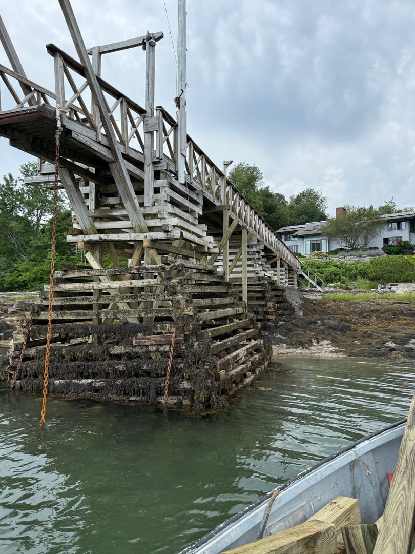 Marine float installation by Midcoast Dock LLC