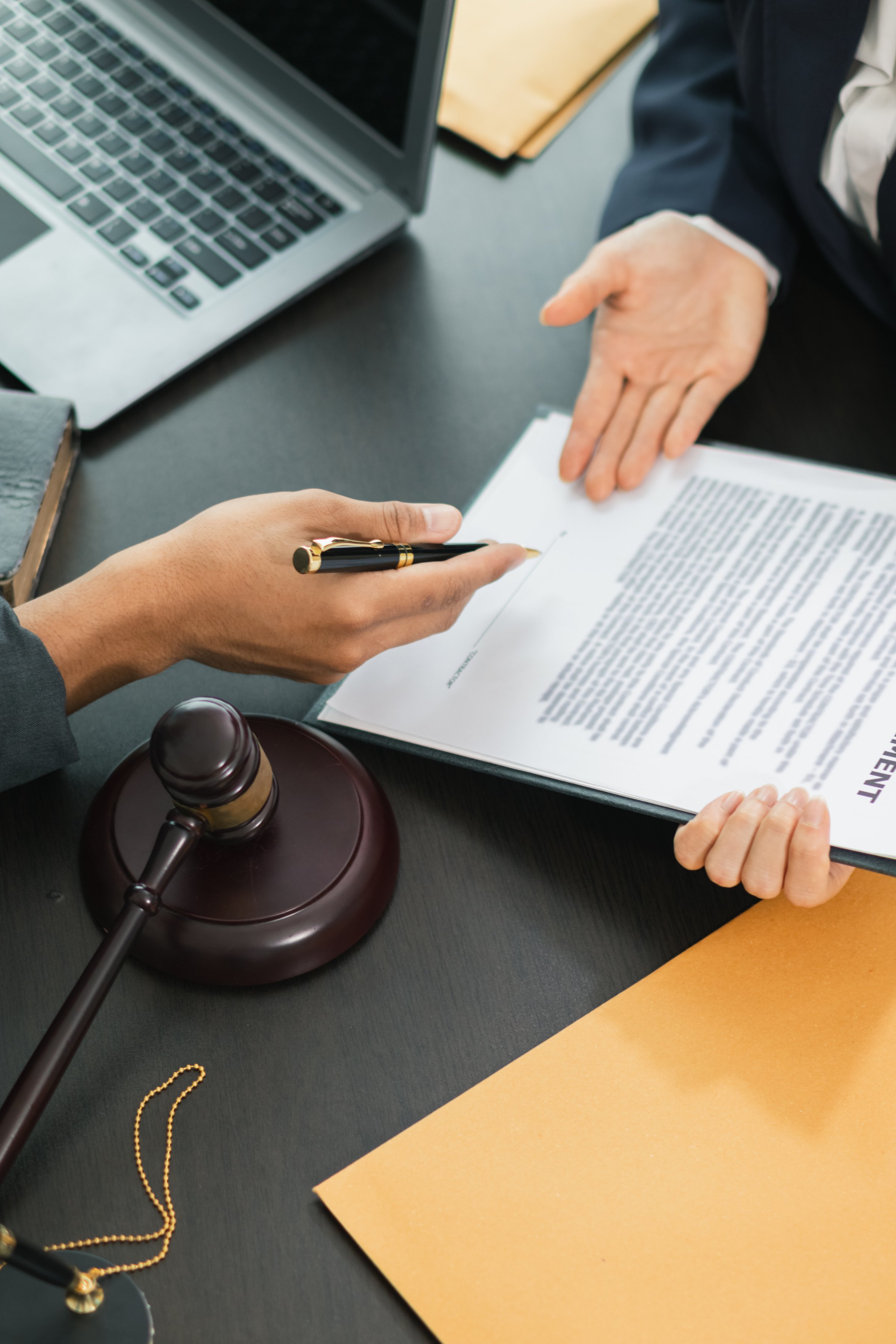 client meets with a lawyer within the legal counsel office to request advice about law and lawsuit that will be filed in order to obtain an advantageous outcome in lawsuit. legal counsel concept