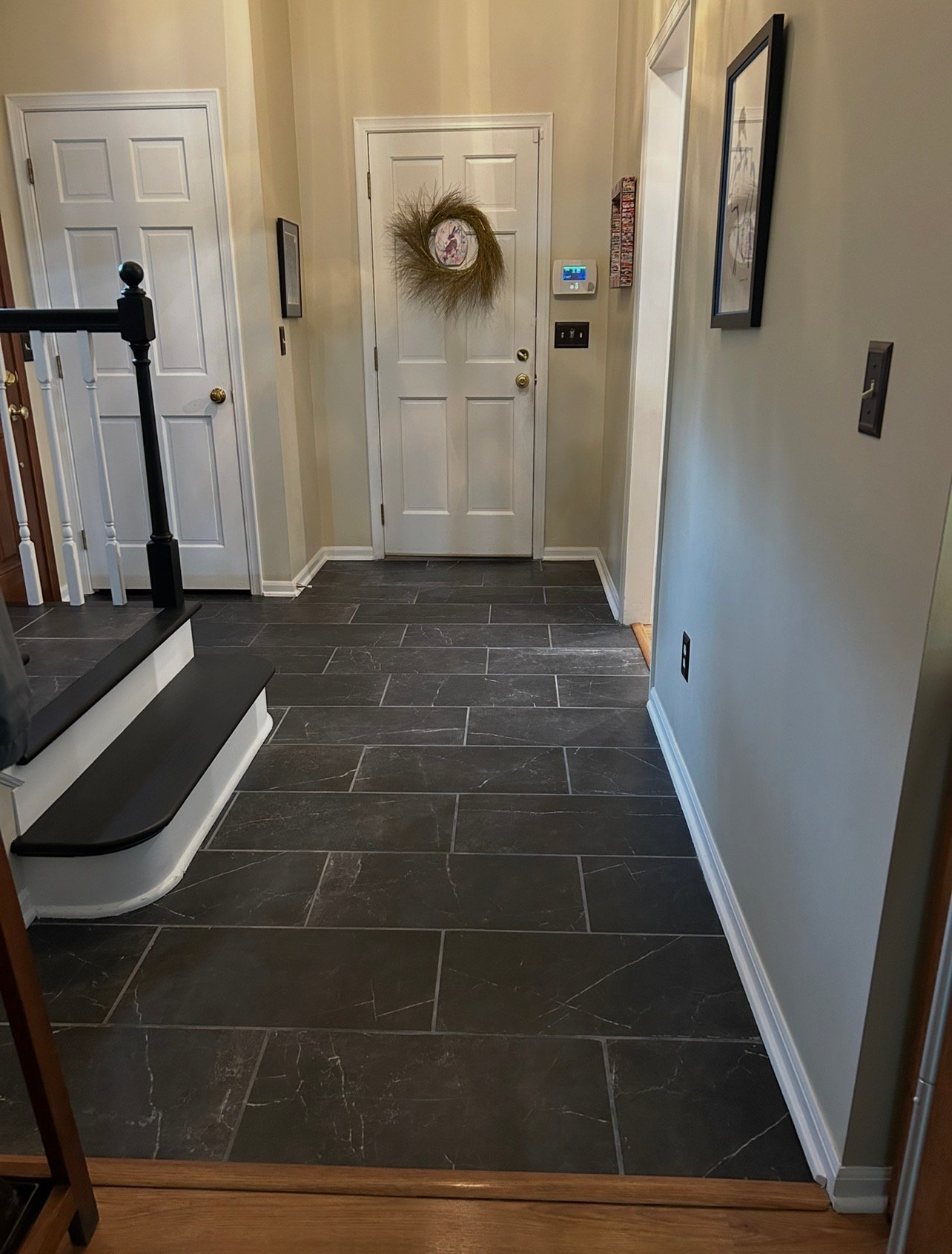 Entryway Tile Installation and Stair Resurfacing - Upper Arlington, Ohio - Photo 1