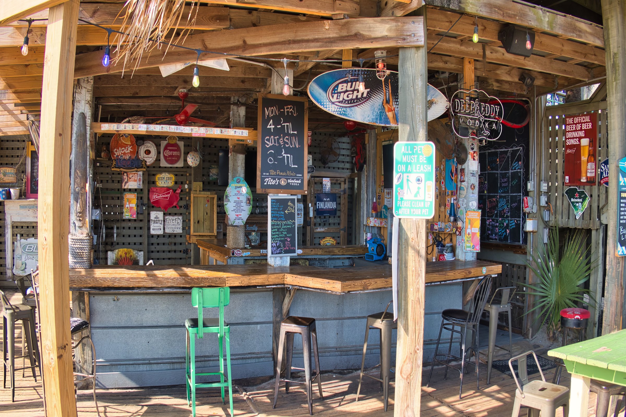 charleston, united states - november 7 2022: outside wooden bar and counter in swamps a long a boardwalk
