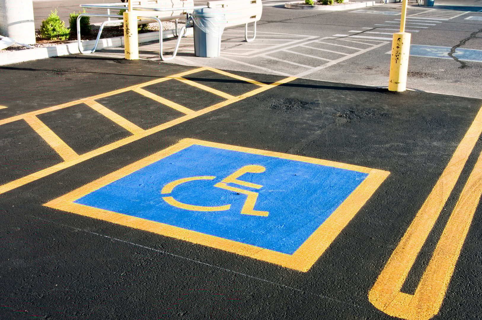 ADA compliant handicap parking space with proper blue markings and signage