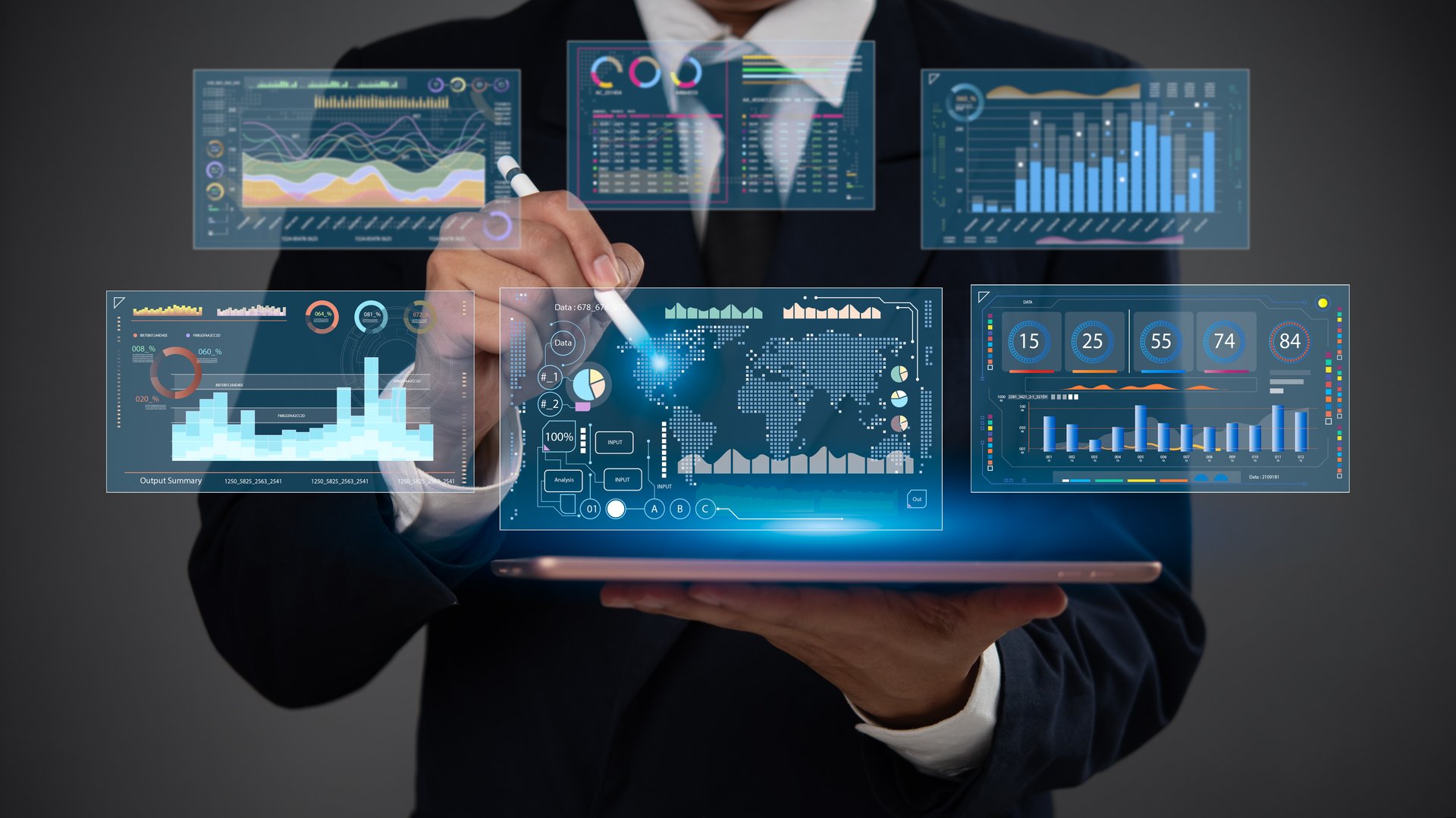 Businessman using a tablet with a stylus to analyze financial data on a futuristic digital dashboard with visual analytics and graphs Business Intelligence BI