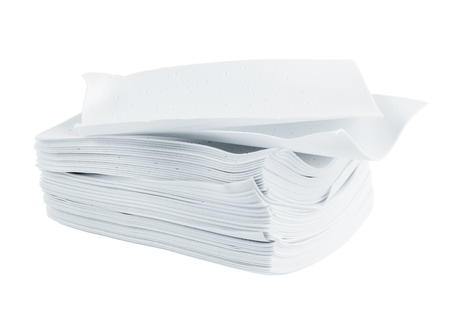 stack of white liquidless and powderless laundry detergent squares sheets isolated on white background.