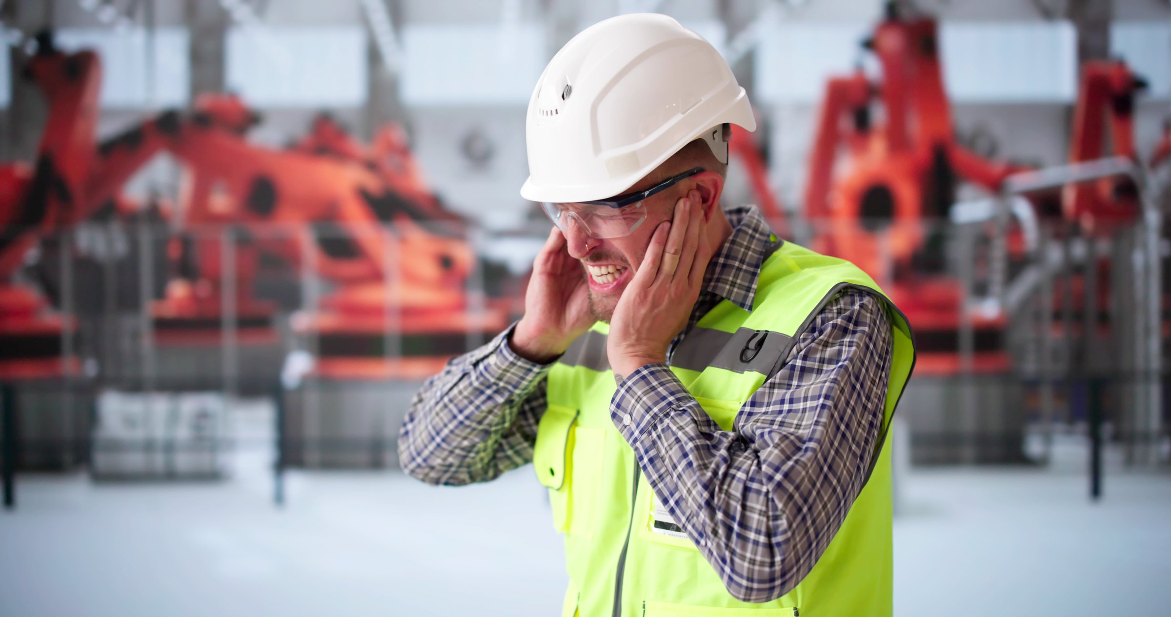 Engineer Suffering From Loud Noise In Car Factory