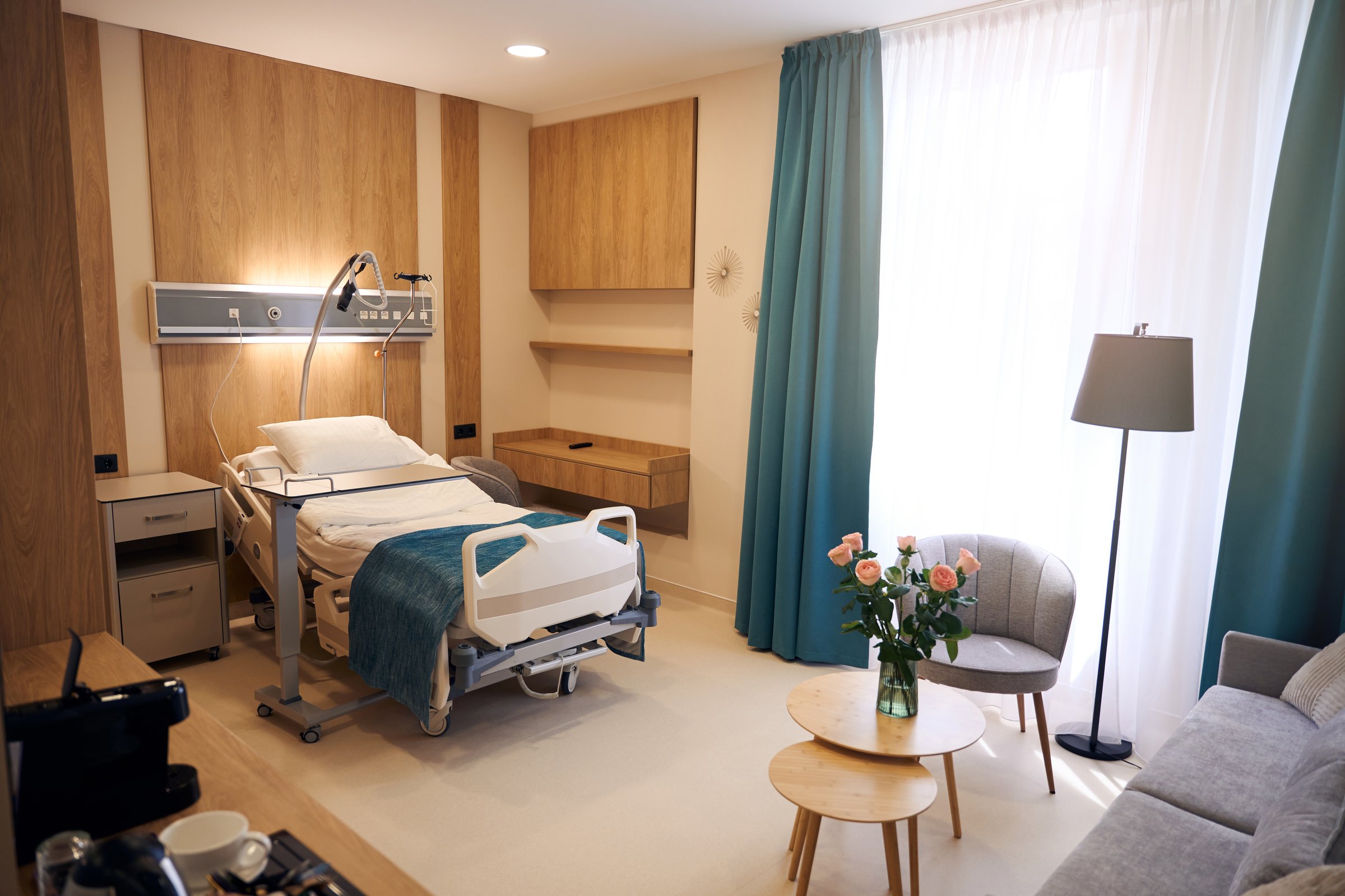 Beautiful interior of empty comfortable medical room with modern furniture in maternity clinic at daytime