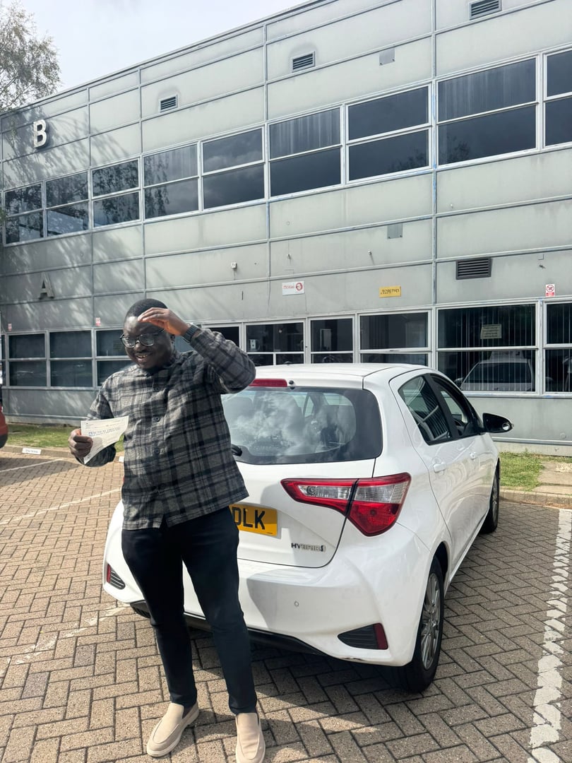 Successful driving test student with pass certificate