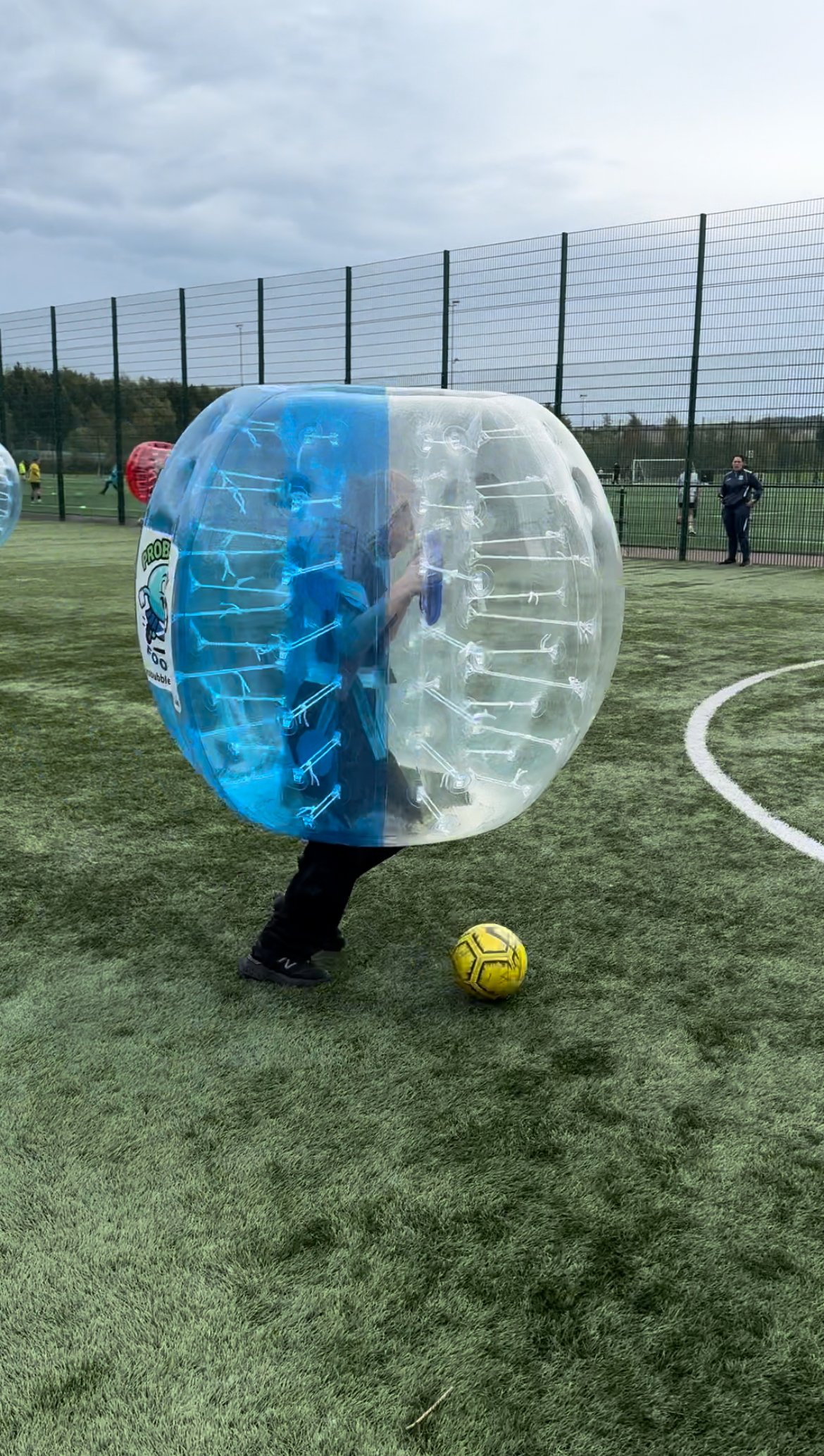 Children enjoying bubble football games