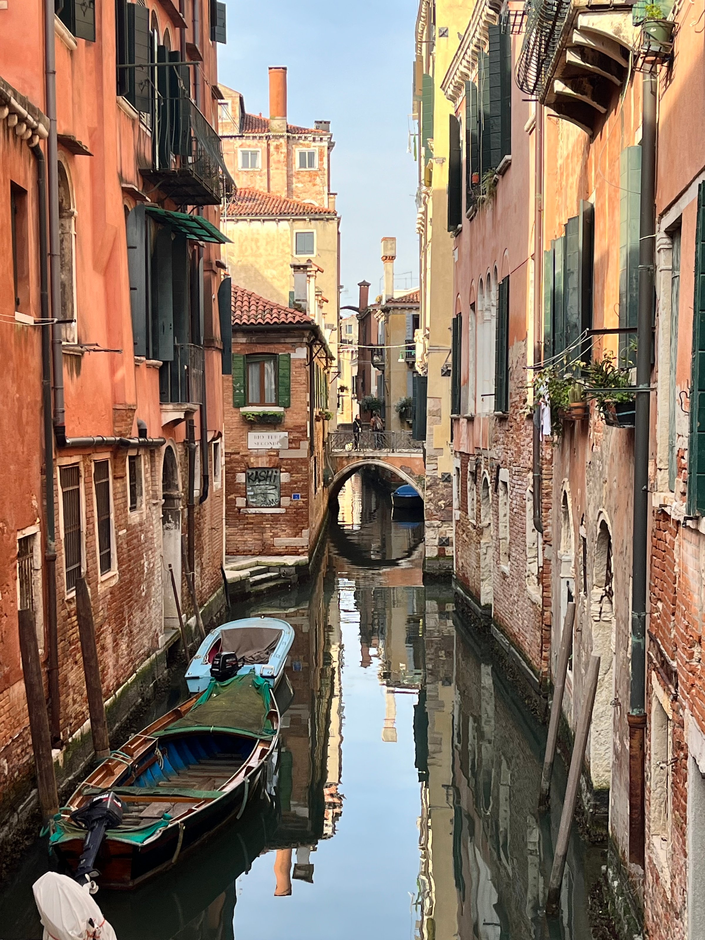 Venezia Italy, Europe - 9 november 2024 - Canal with old buildings with boats and bridge