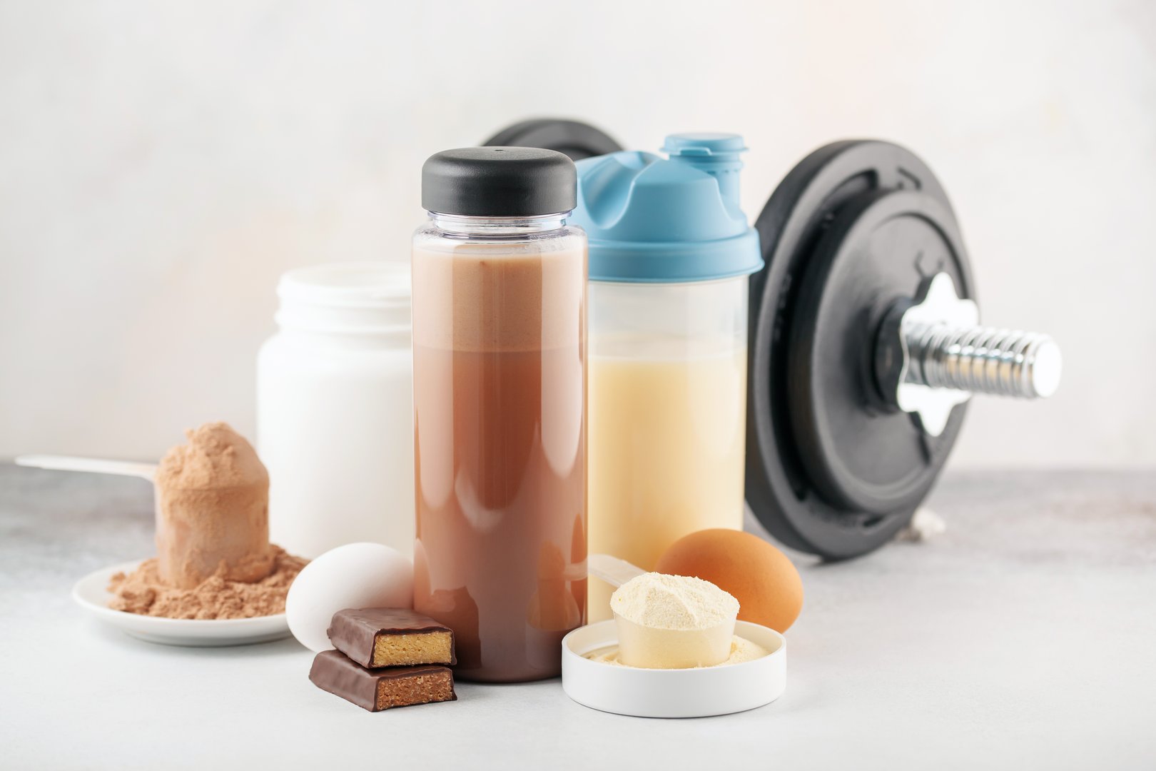 Protein sport shake, powder eggs and bar. Fitness food and drink. Diet