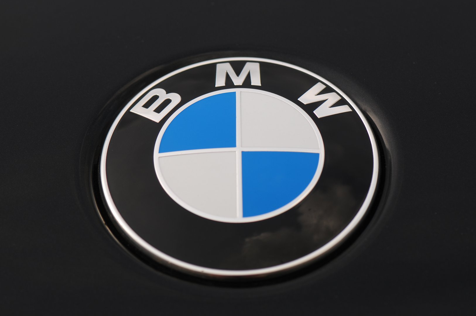 Hanover, Lower Saxony, Germany-September, 4th 2011: BMW 5 Series logo parked at Hanover airport.