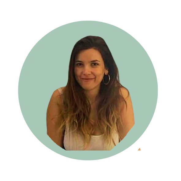 Smiling woman with long hair and hoop earrings against a green circular background.