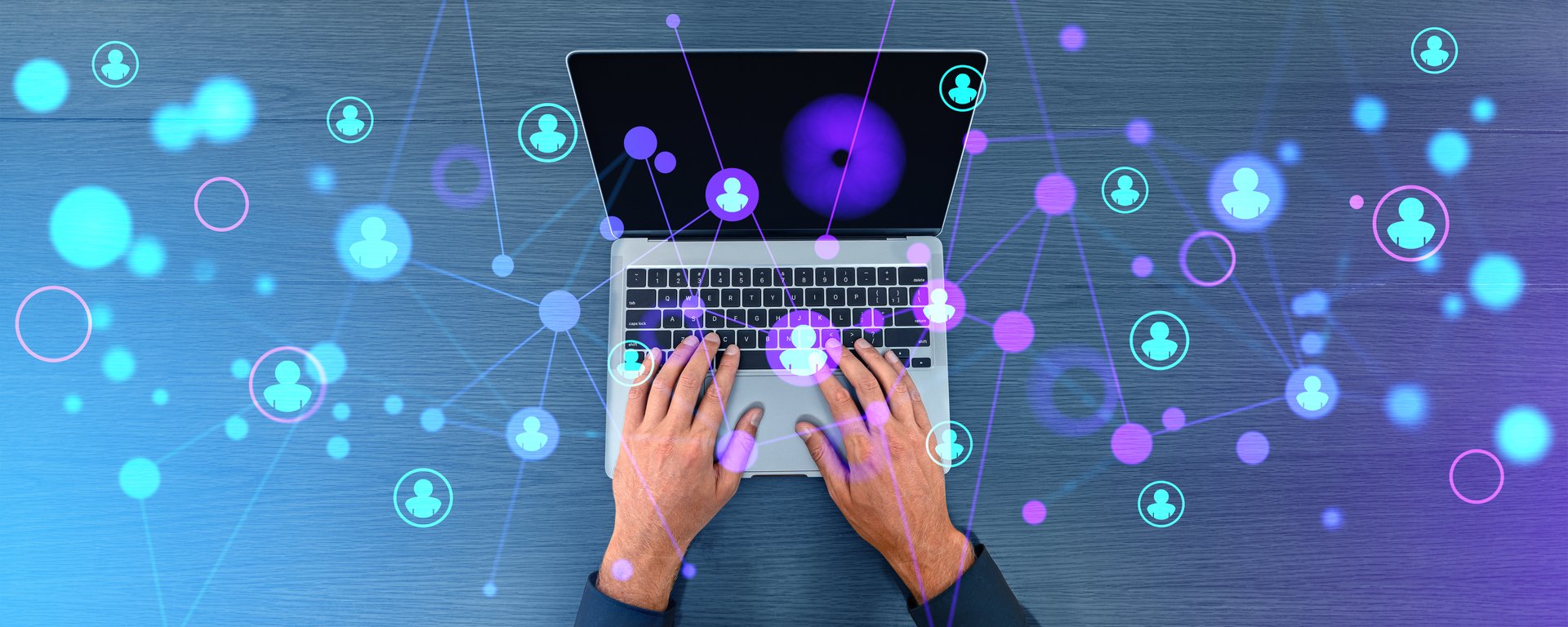 Top view of man hands typing in laptop. Glowing people icons connected, digital lines and circles. Concept of human resources, management and online teamwork