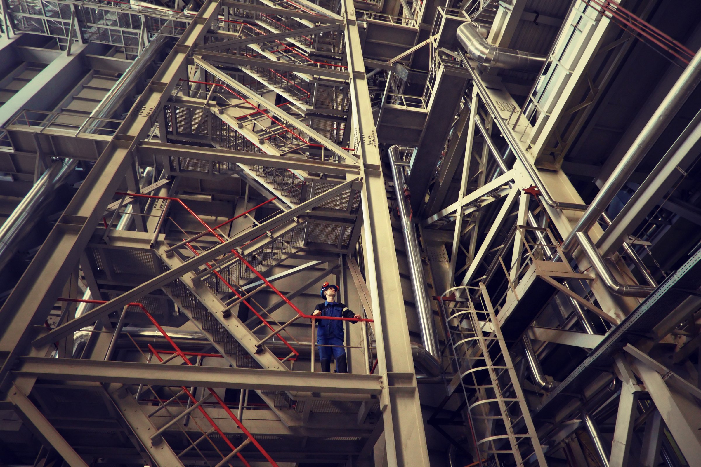 The interior of an industrial facility with the workers.