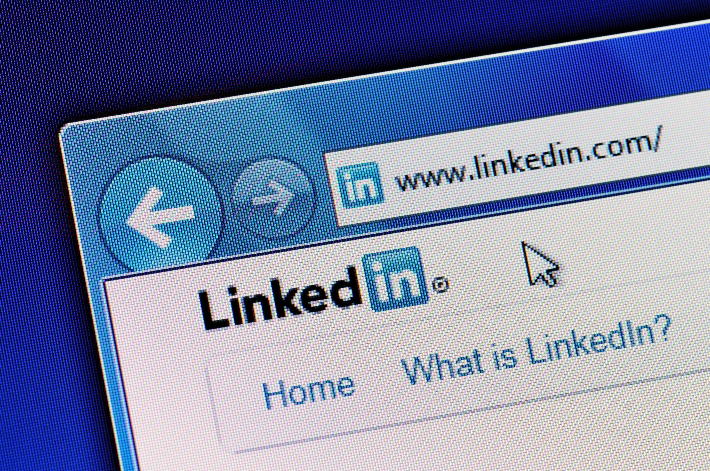 Linkedin homepage is displayed in web browser on a computer screen. Linkedin.com is a business-oriented social networking site.