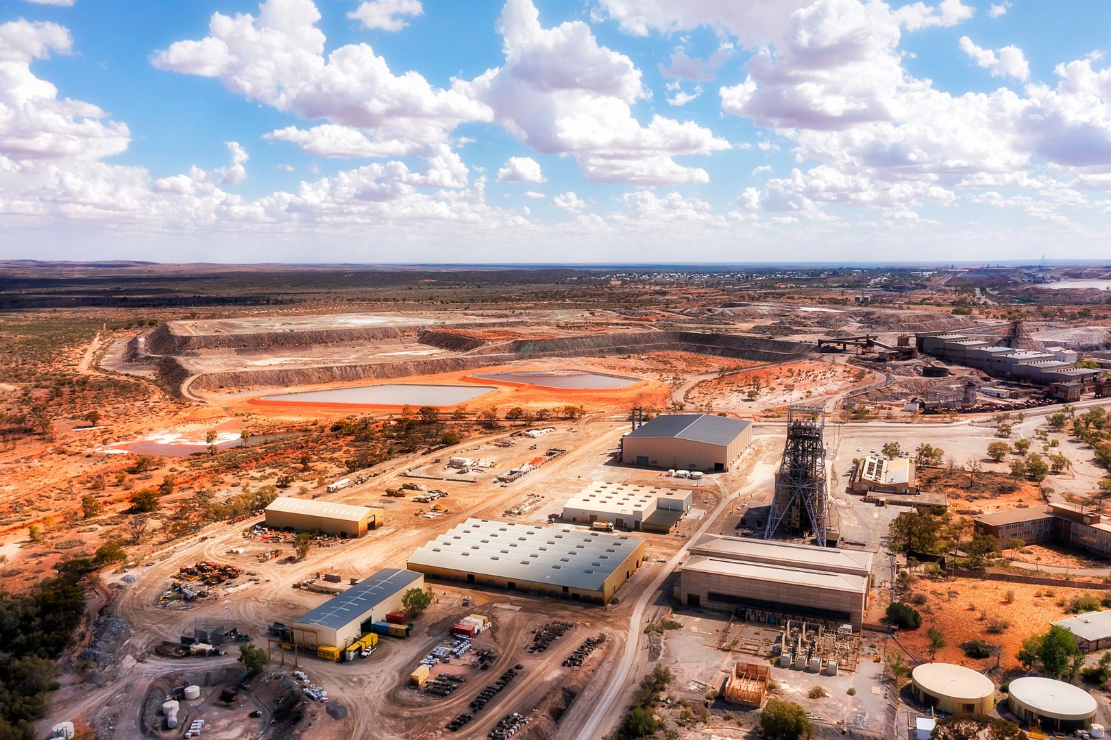 Broken hill mining town in Far West of Australian NSW - aerial townscape over industrial open pit mine.