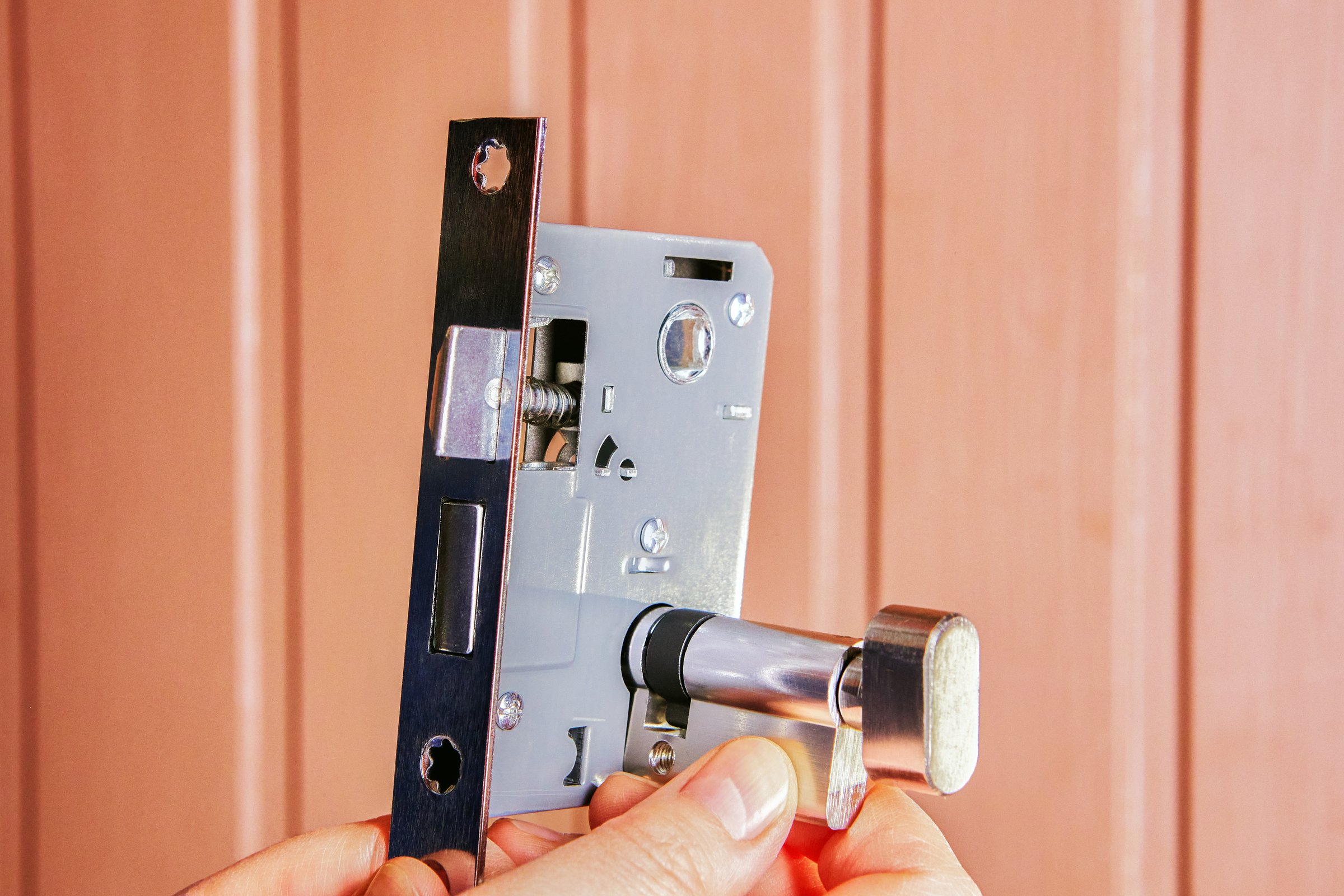 Mortice lock fitting process on internal door.
