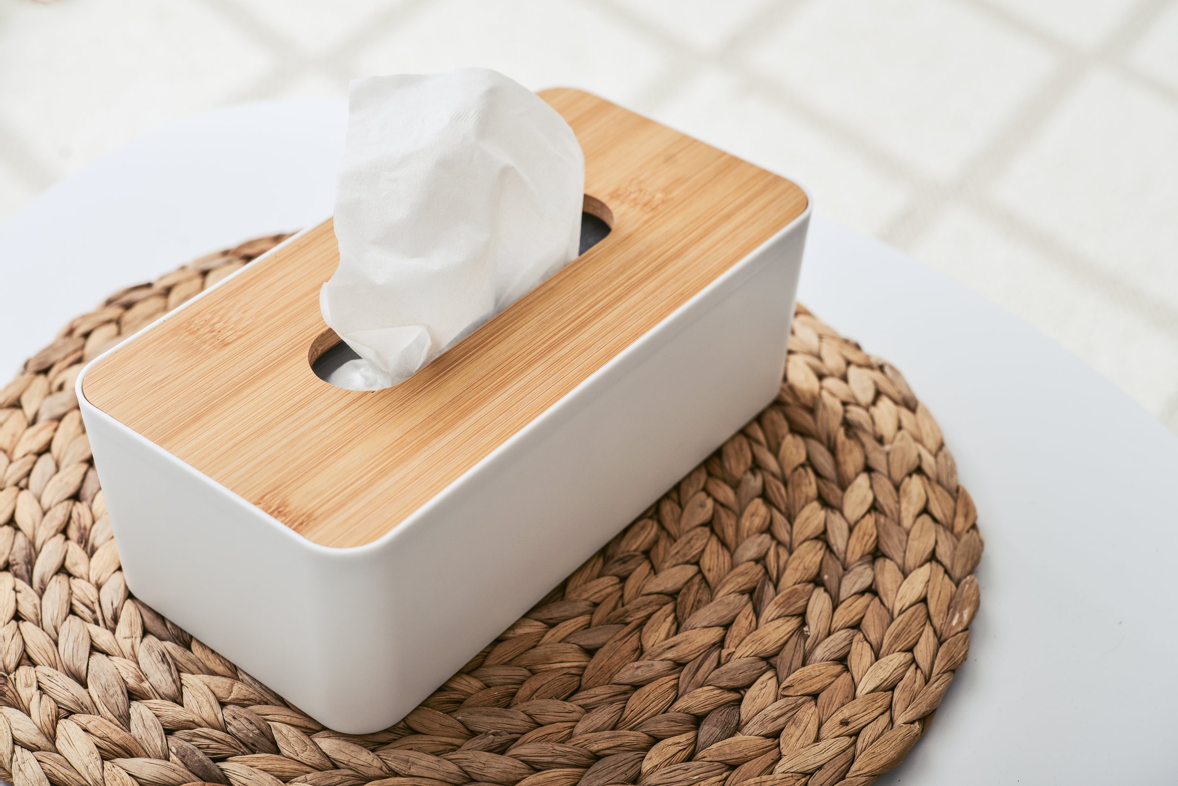 White tissue box with wooden bamboo top