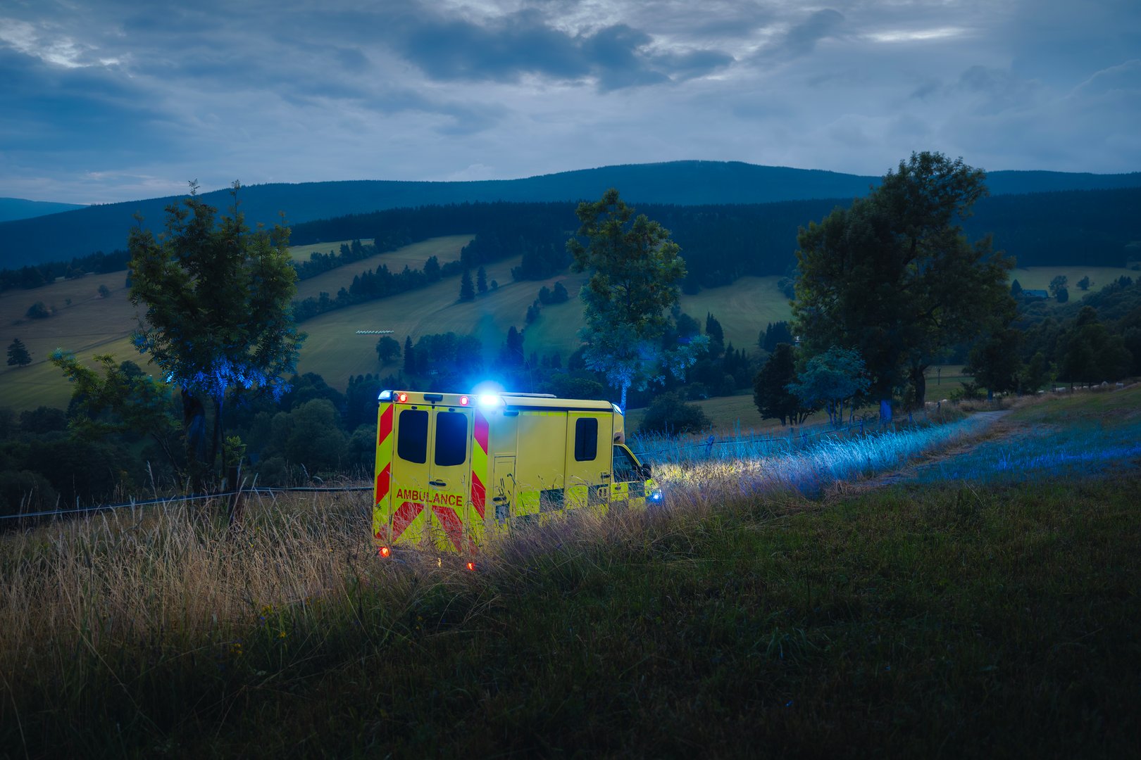 Ambulance car of emergency medical service on mountain road