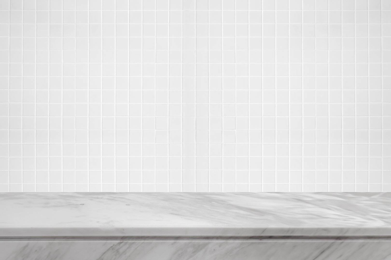 Empty white marble table top with blur tile wall bathroom background