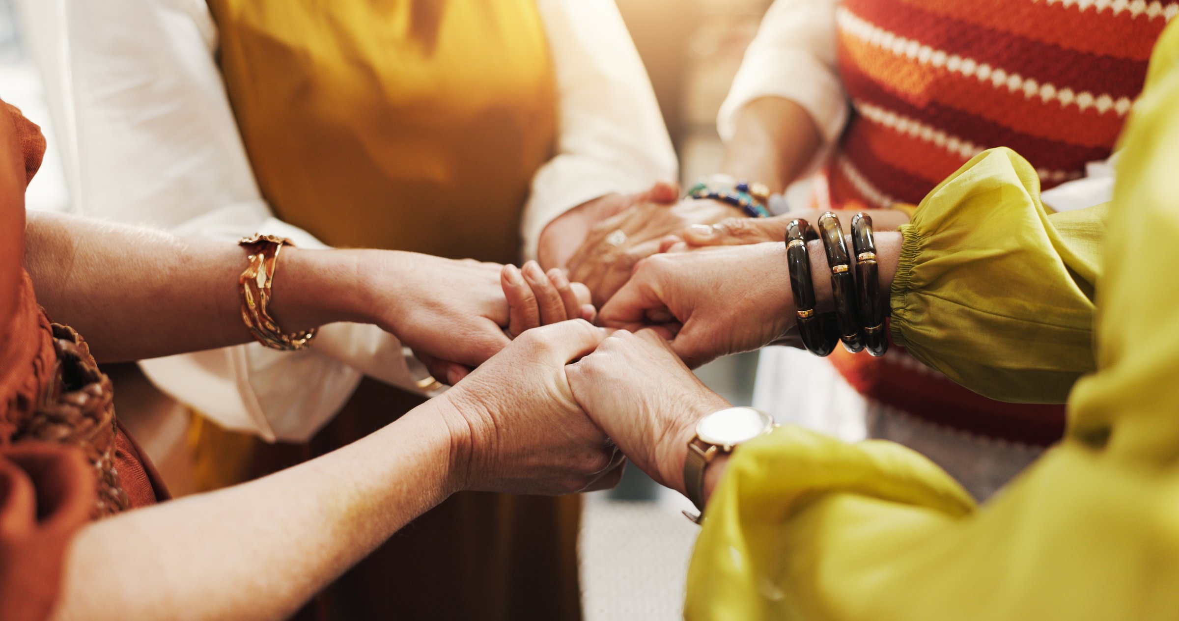 Women, holding hands and prayer circle for solidarity, faith and healing