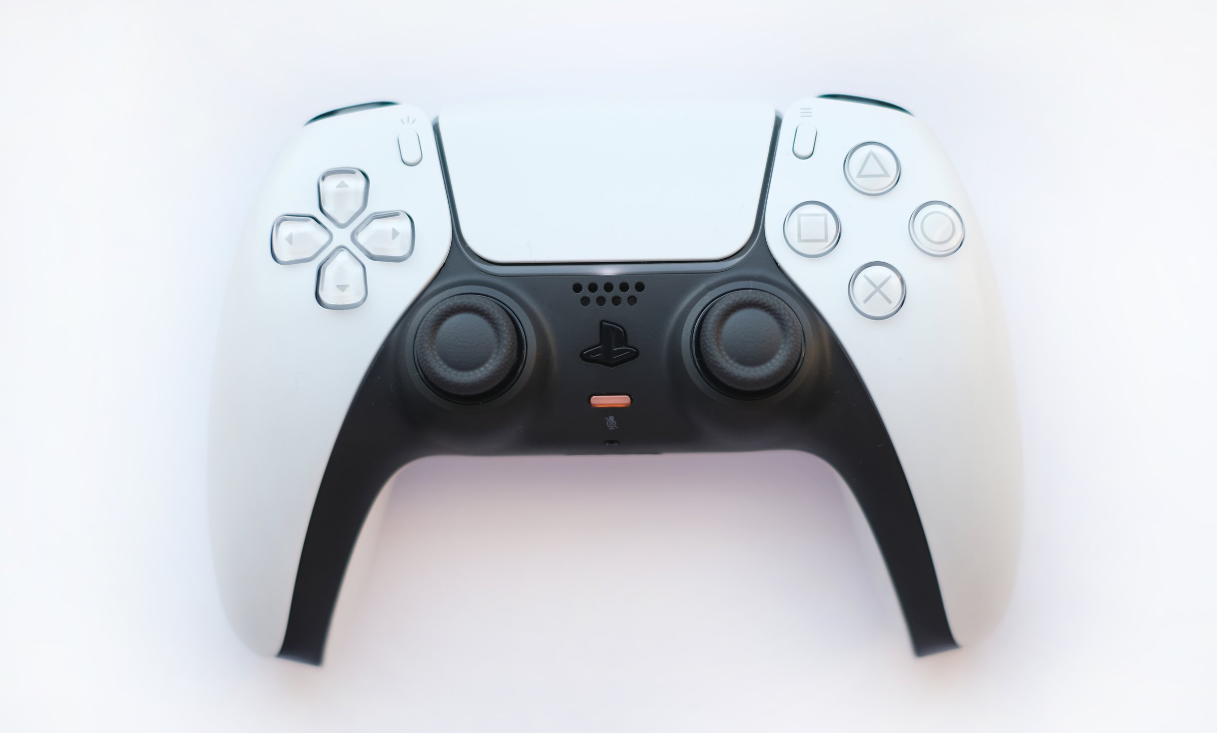 Joystick for game console PS5 isolated on white background. The concept of leisure and entertainment.