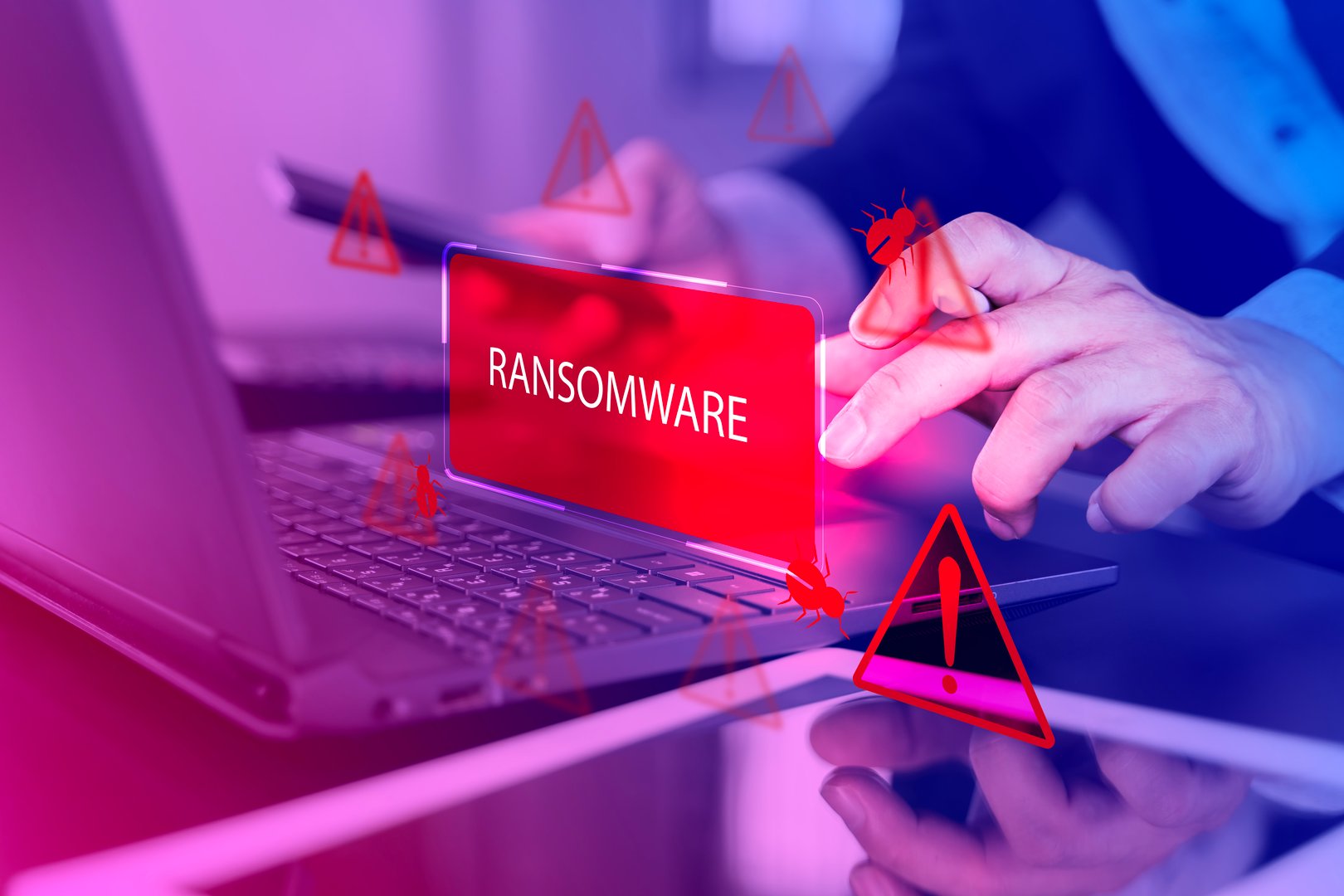 Malware attack virus alert. Person use laptop with virtual warning sign with ransomware word, warning notification. Cyber threats.Cyberattack cybercrime hacker smartphone. Internet web hack technology