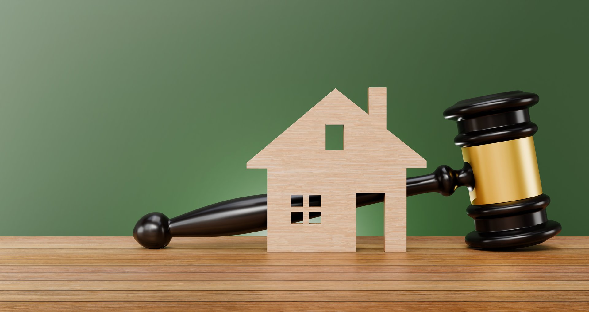 Model house and gavel on the table