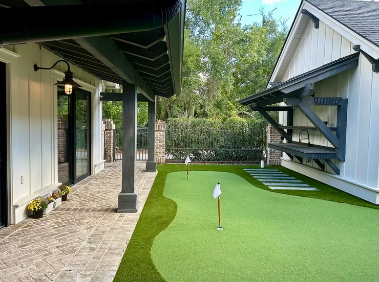 Professional backyard putting green installation