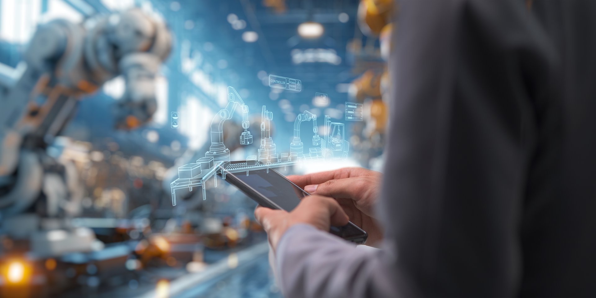 Control the work with an infographic screen. Precision engineering A robotic arm at work in a fully automated facility.