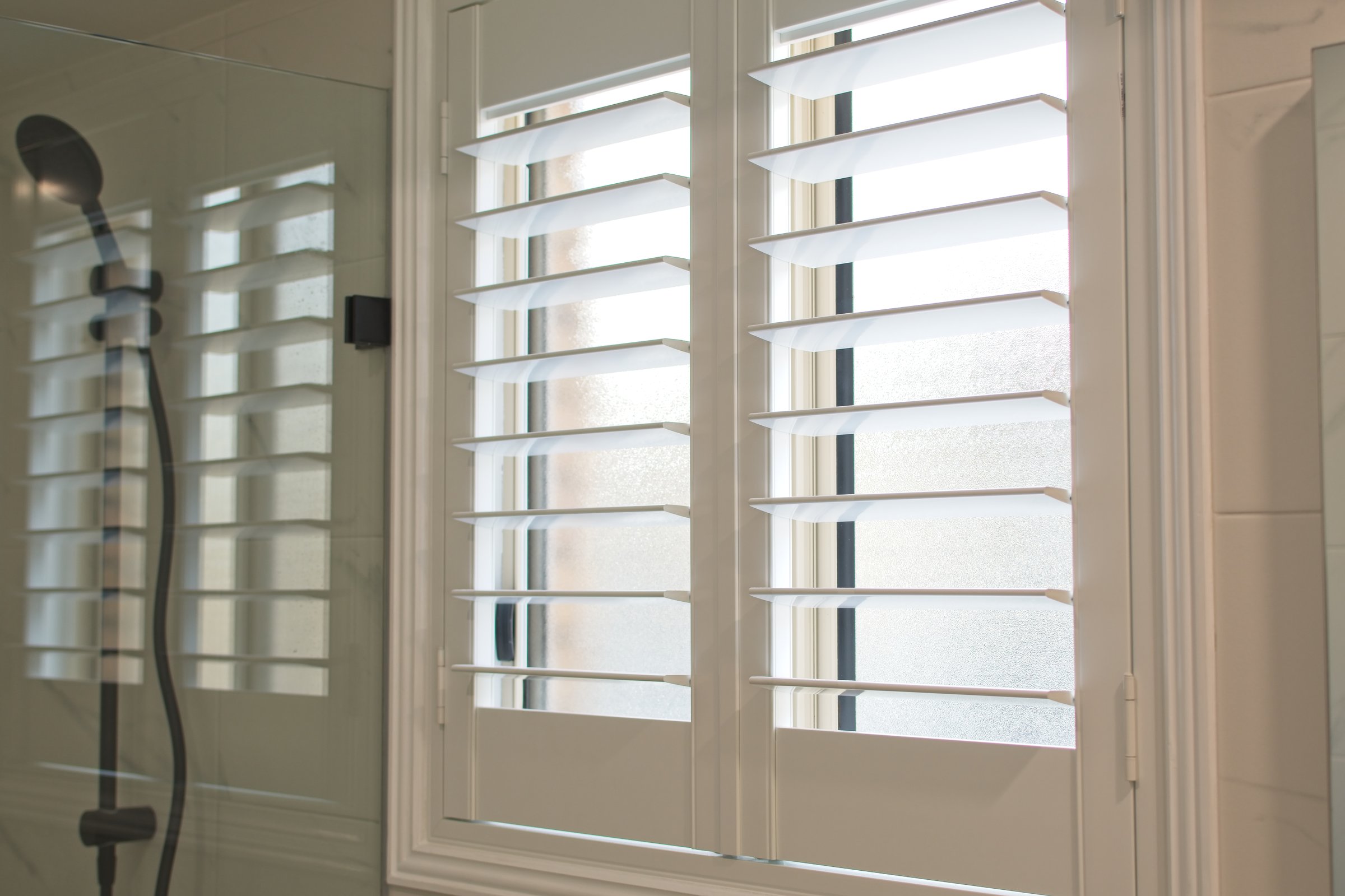 Luxury plantation shutters in bathroom