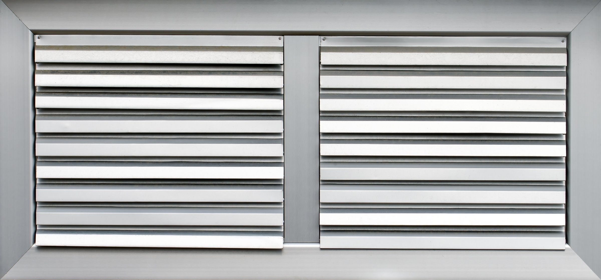 Aluminum shutters on a window
