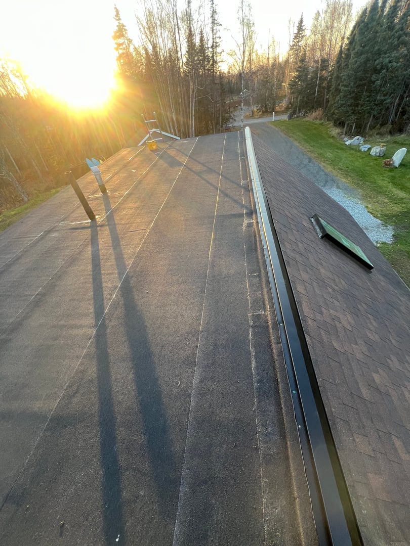 Commercial roofing Anchorage Alaska - flat roof project with drainage systems and roofing materials showcasing professional craftsmanship