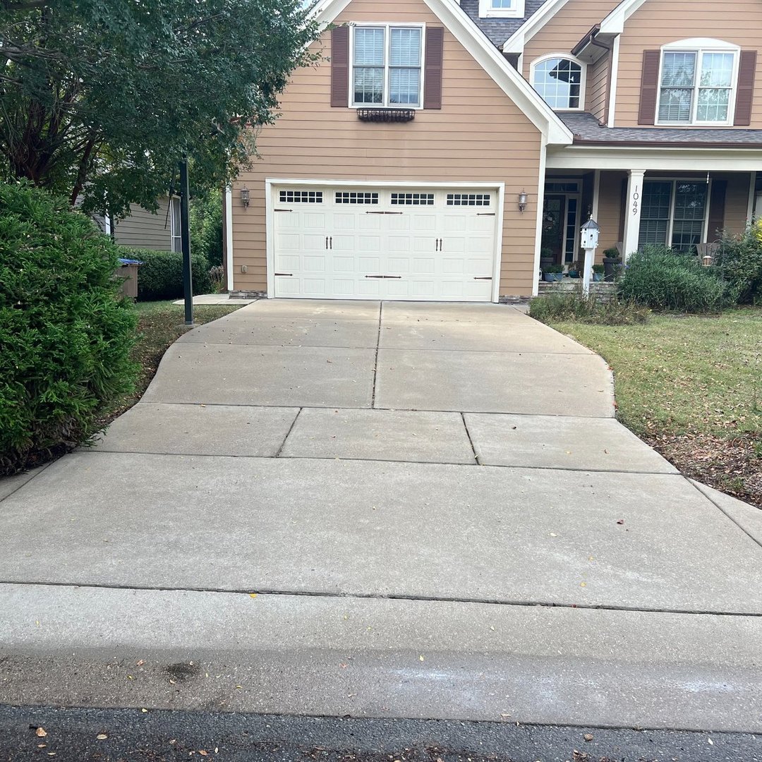 Before driveway cleaning in Wake Forest NC - dirty concrete