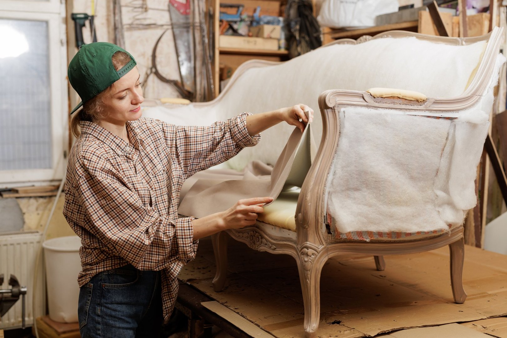 Woman restoring old furniture