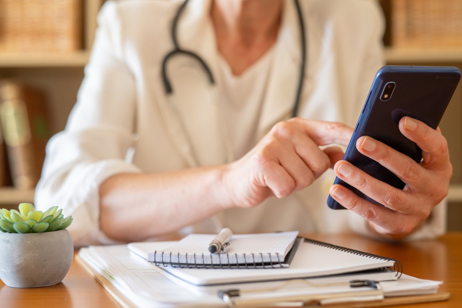 Healthcare professional with smartphone