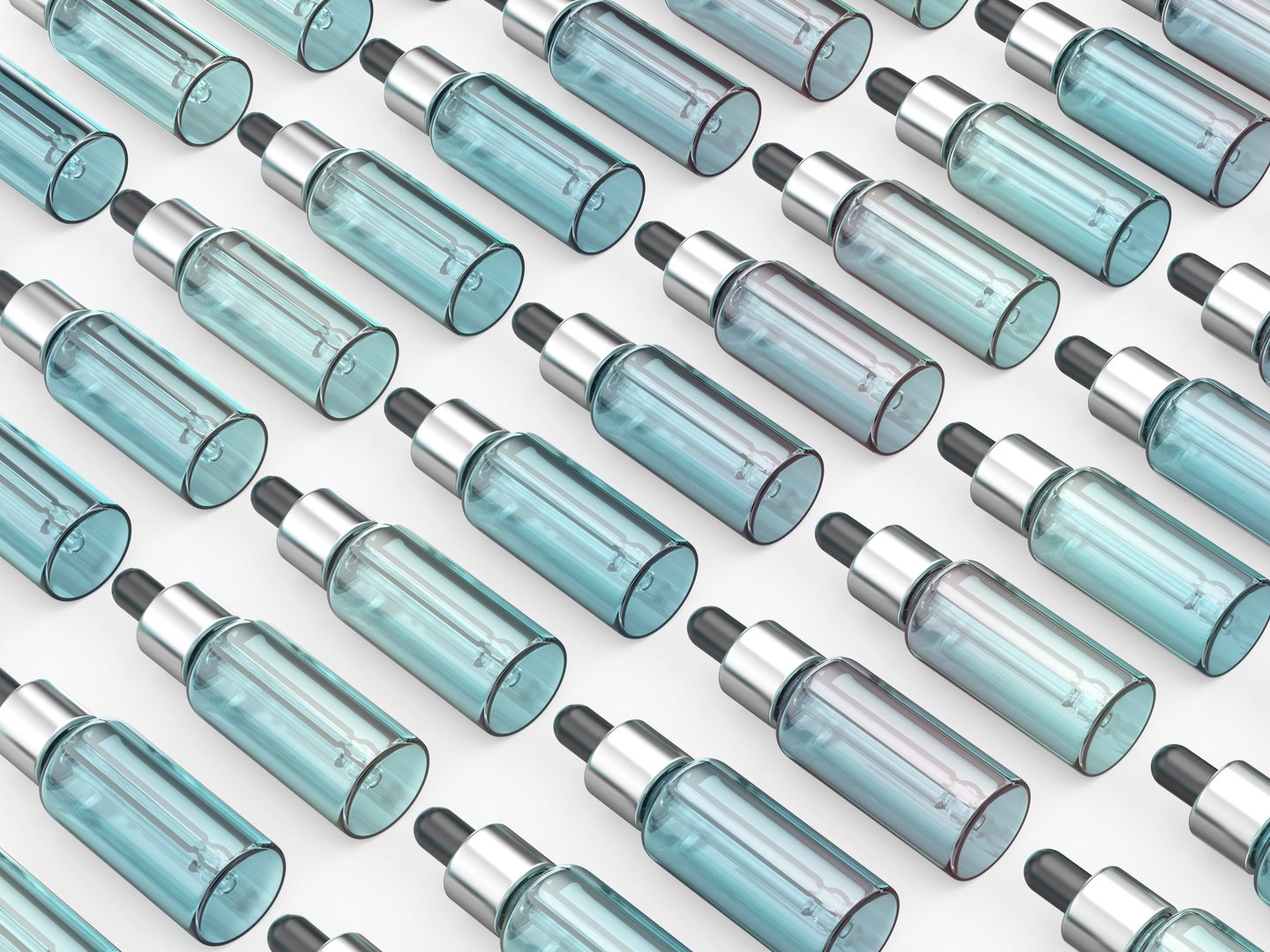 Multiple rows of glass dropper bottles on a white background