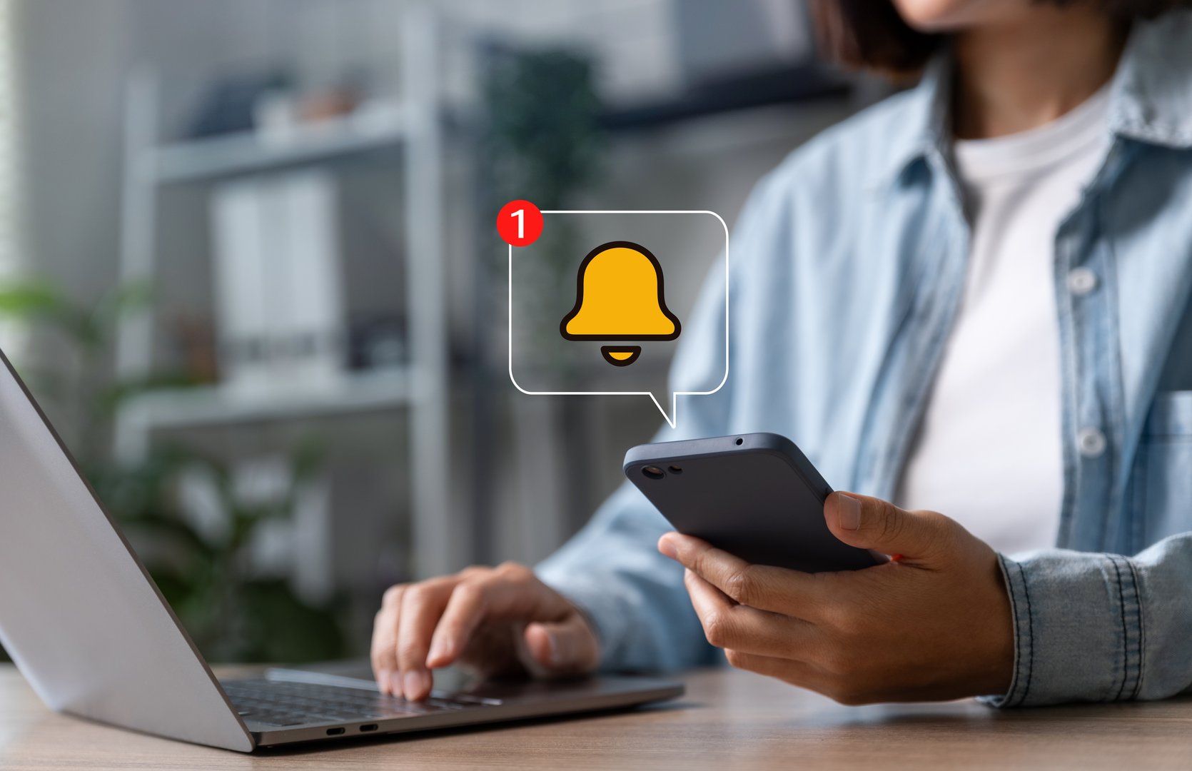 Online alerts on the application concept, Young woman holding smartphone with bell for notification.