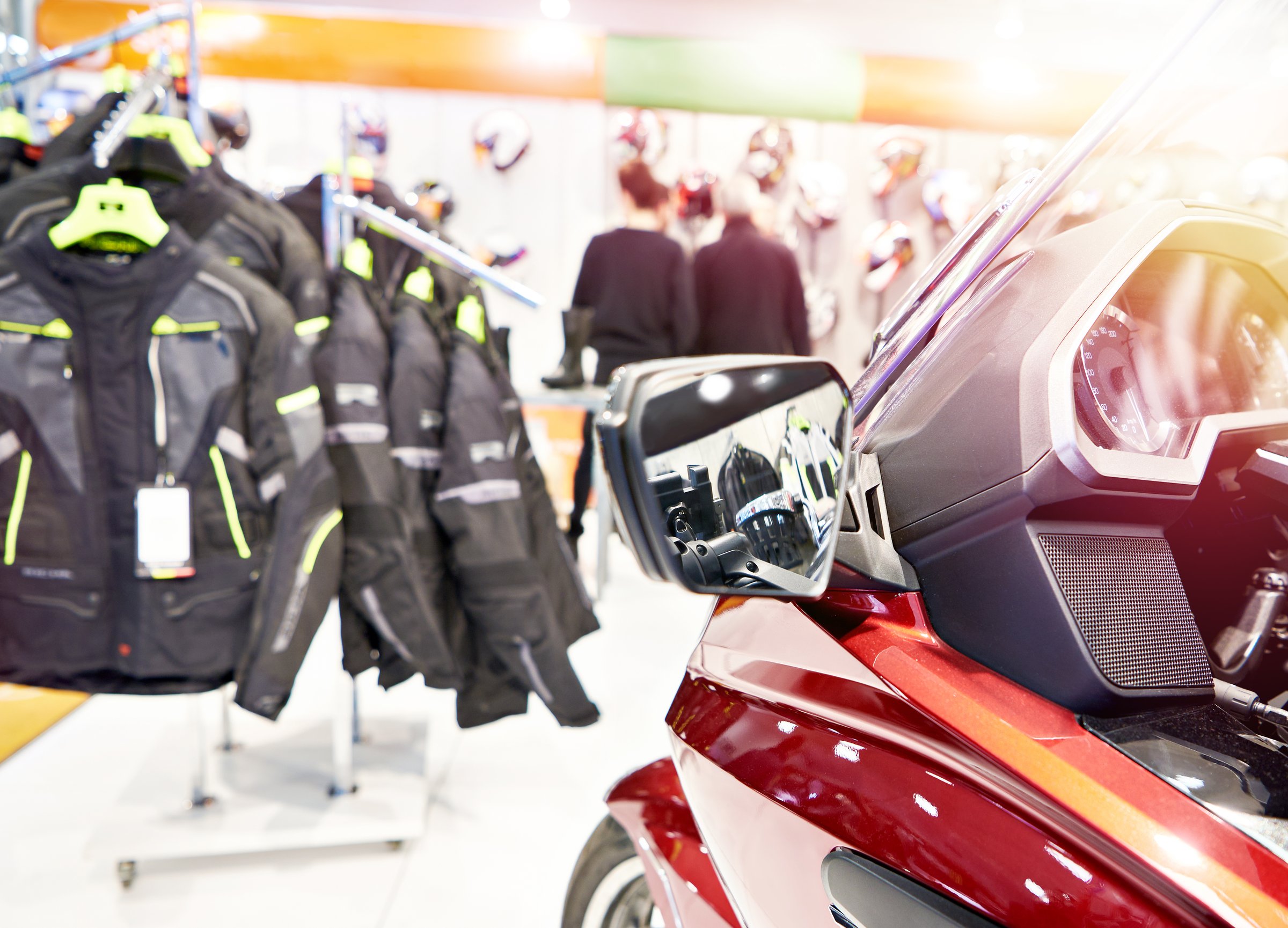 Motorcycle, accessories and clothing store and people