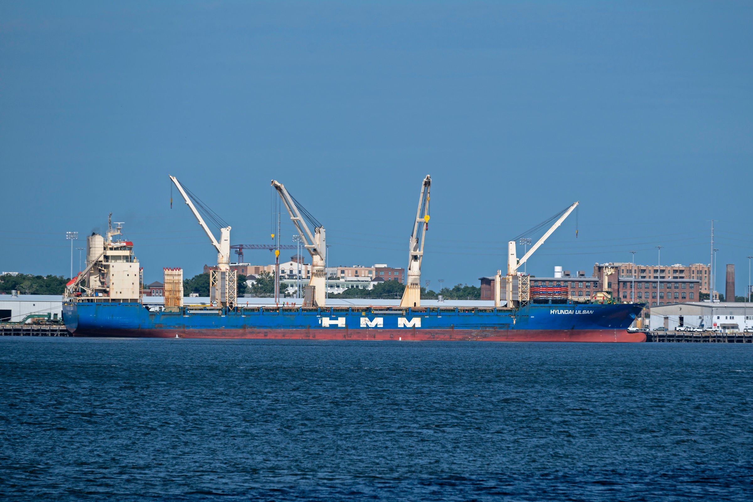 Charleston, SC, USA - July 02, 2025: HMM Ulsan, a 193-meter dry-bulk cargo ship owned by Hyundai Merchant Marine and flagged to Marshall Islands, moored at Columbus Street Terminal, Charleston Harbor.