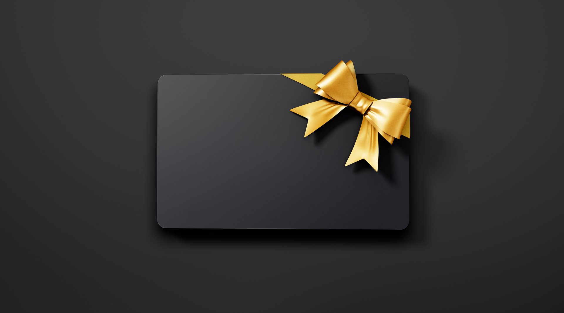 Black Gift or Credit Card on dark Background with golden bow and copy space - 3D illustration