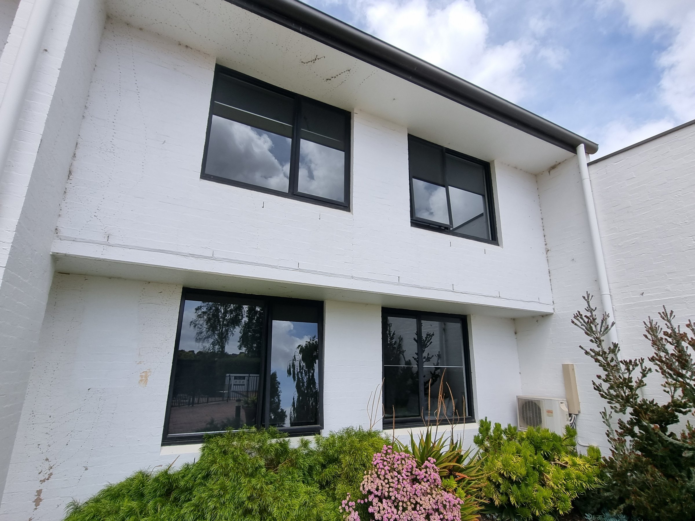 Quality Painting Group office building project - additional before view showing original building condition