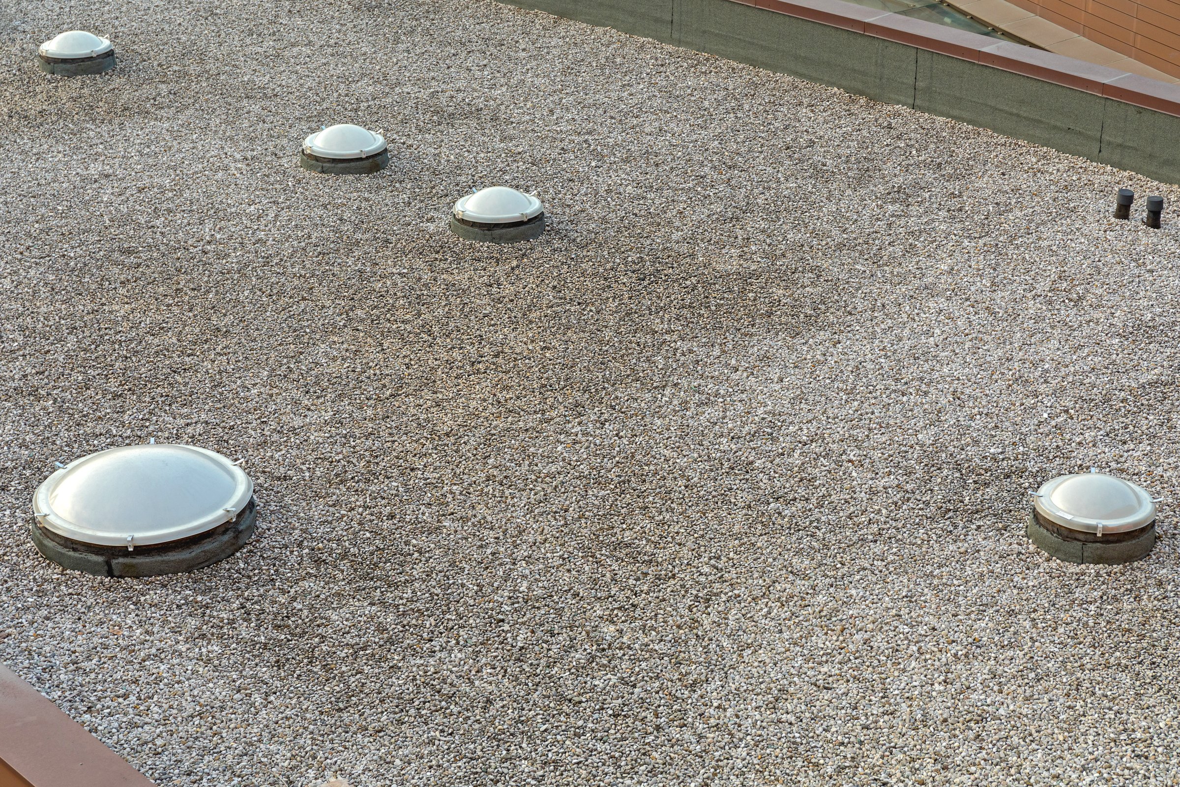 Many Plastic Cover Skylight Window at Gravel Industrial Flat Roof Structure