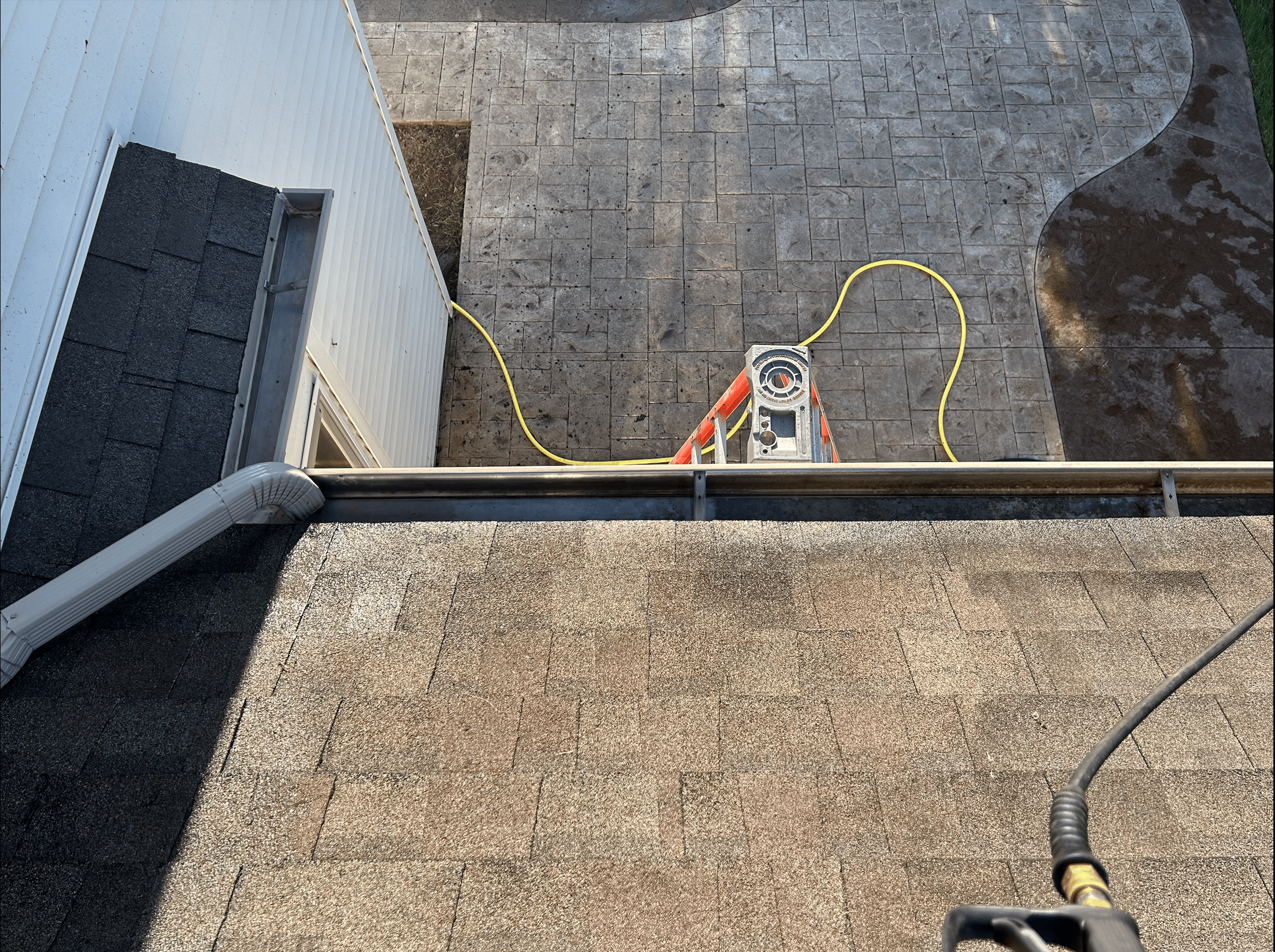 Gutters after cleaning showing clean and clear condition