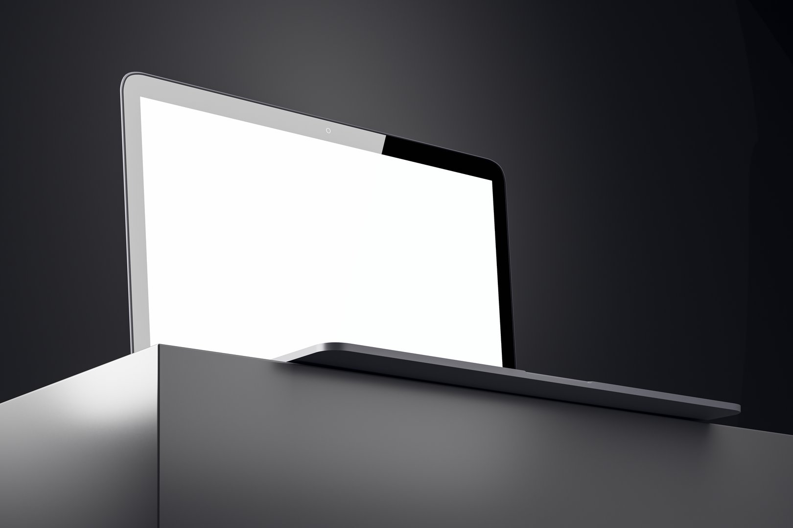 Modern open laptop with blank white display on sleek podium, metal design in dark studio spotlight, isolated work technology concept. 3D Rendering.