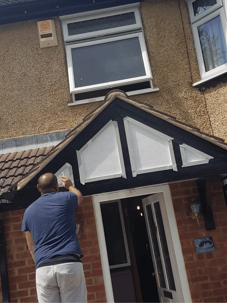 Exterior painting project showing a freshly painted property exterior