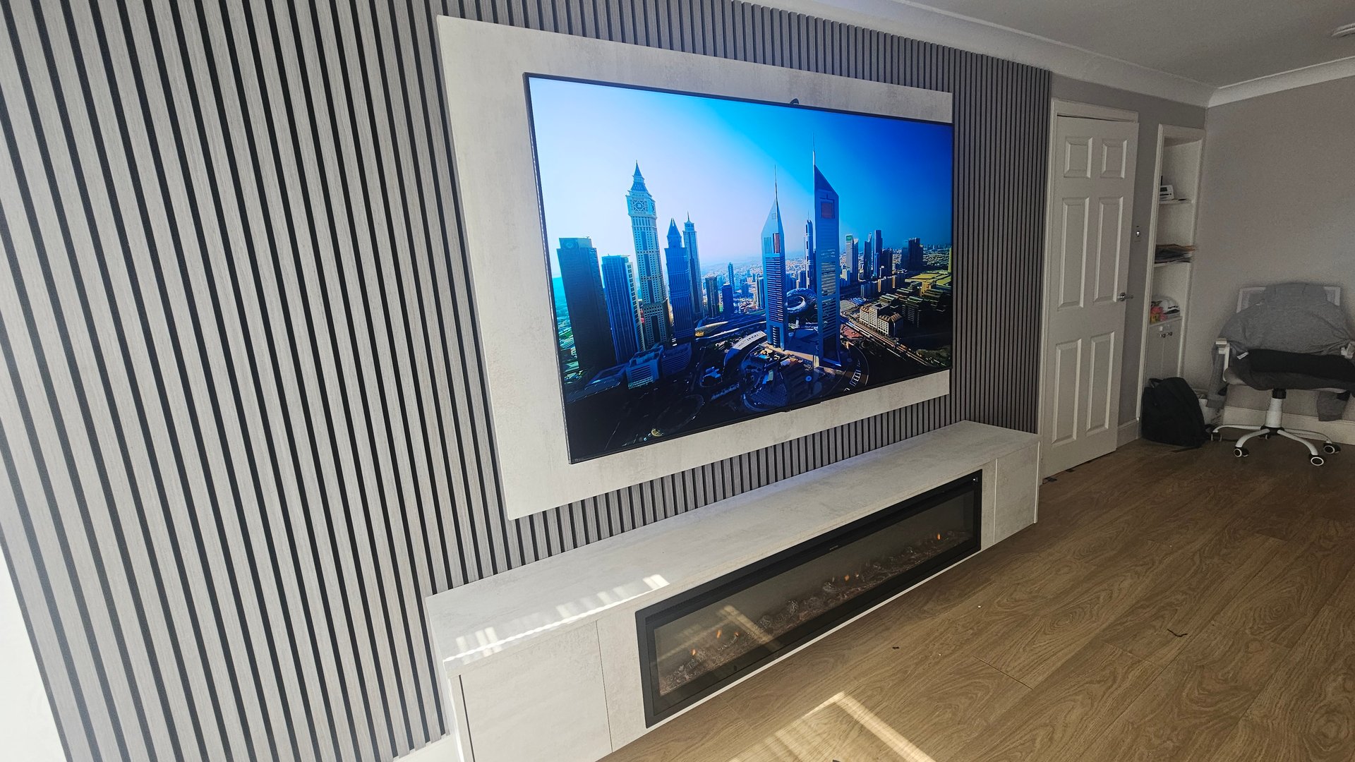 Custom media wall with fireplace integration