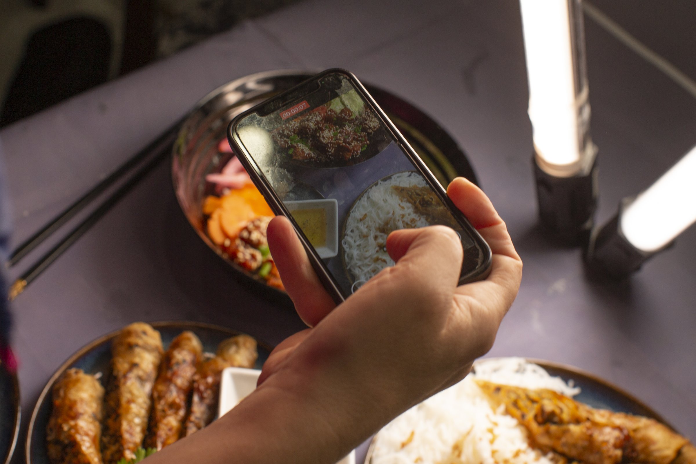 Taking photo of food meal