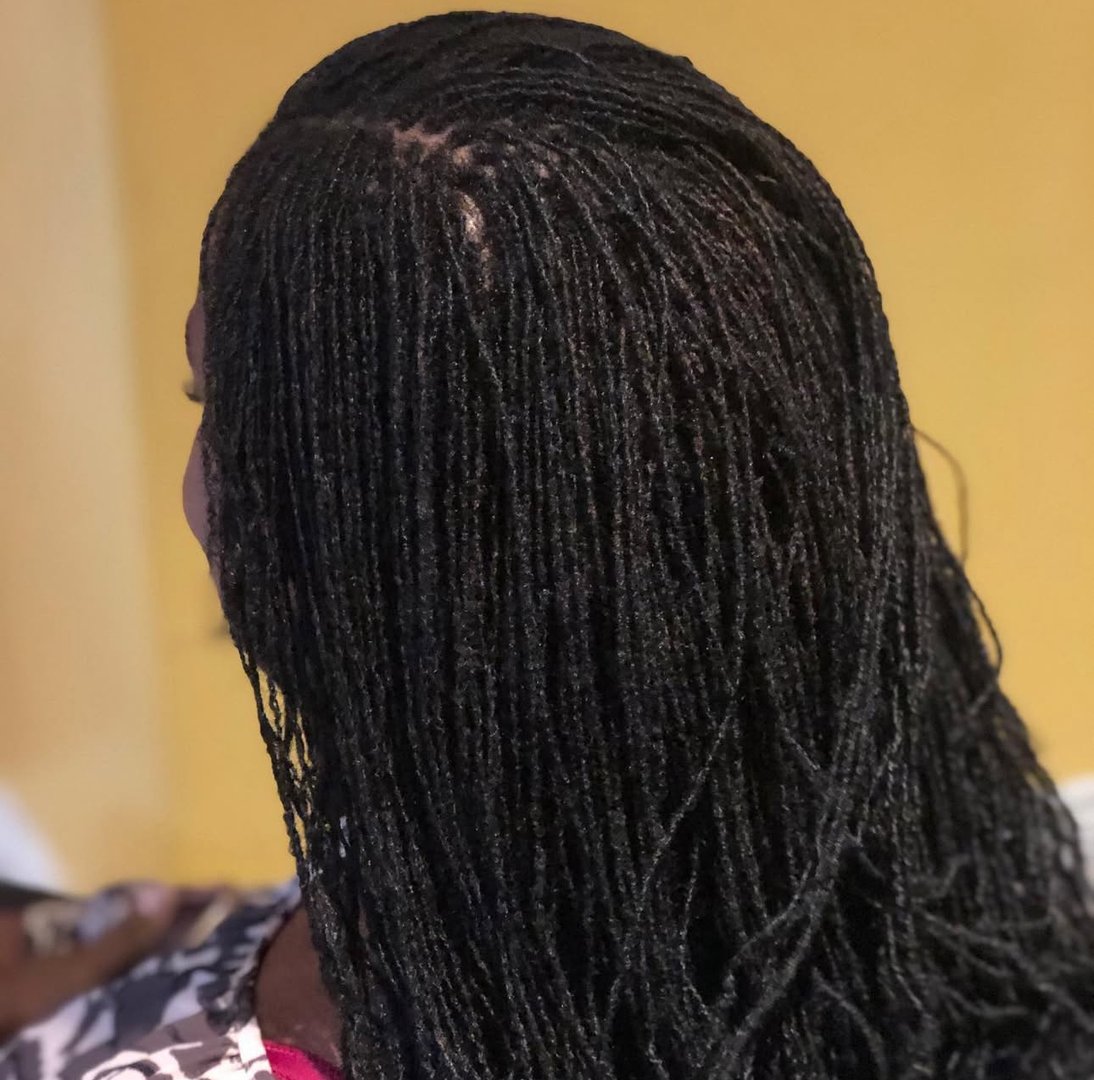 Black woman with natural hair looking confident